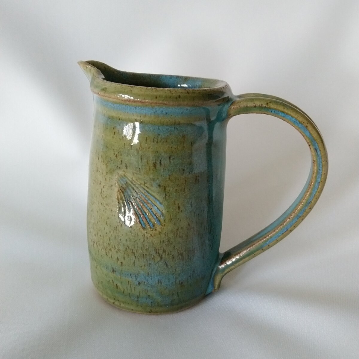 Green/Turquoise Jug with shell pattern - Midlands Potters